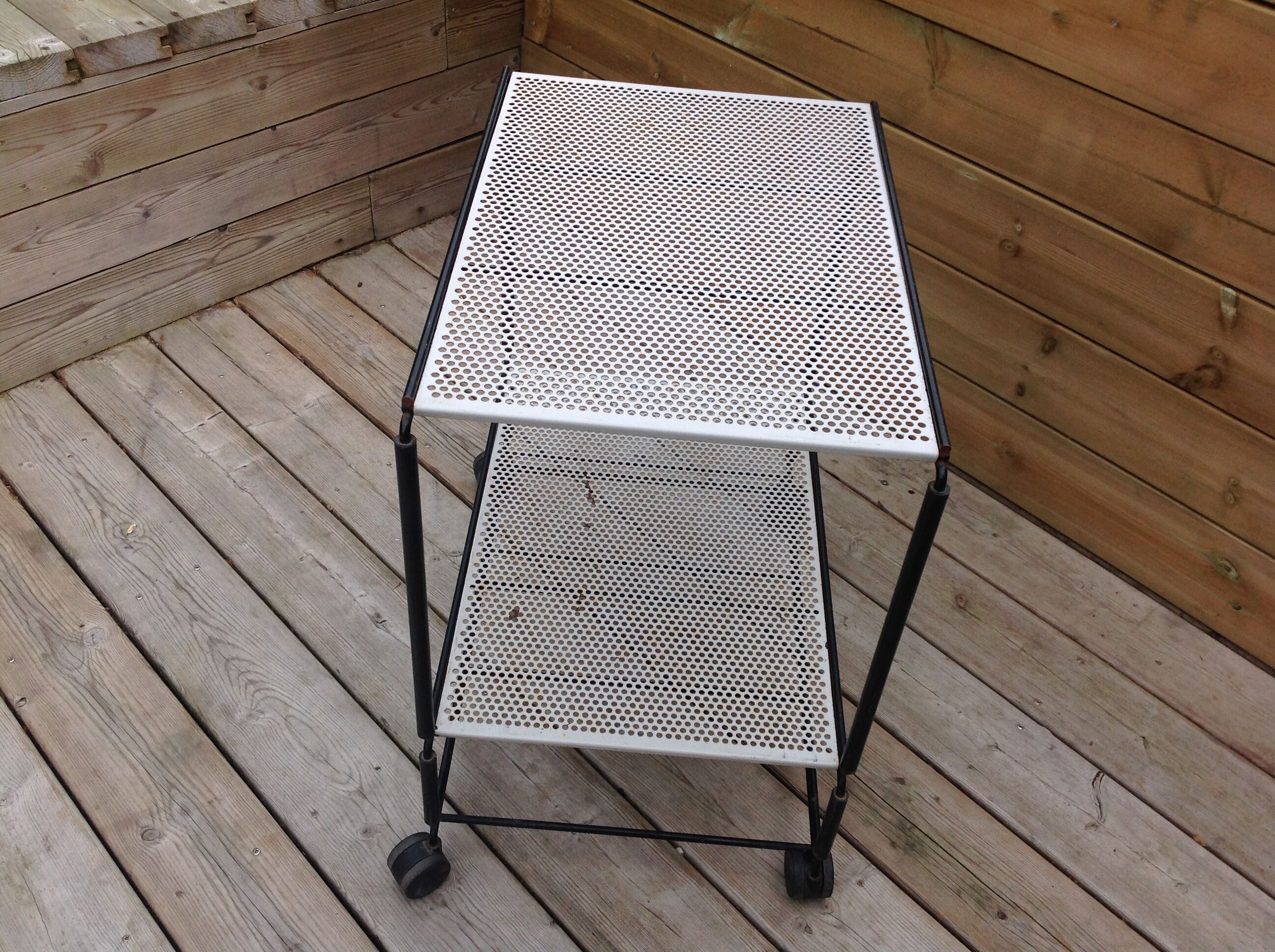 Perforated iron rolling table