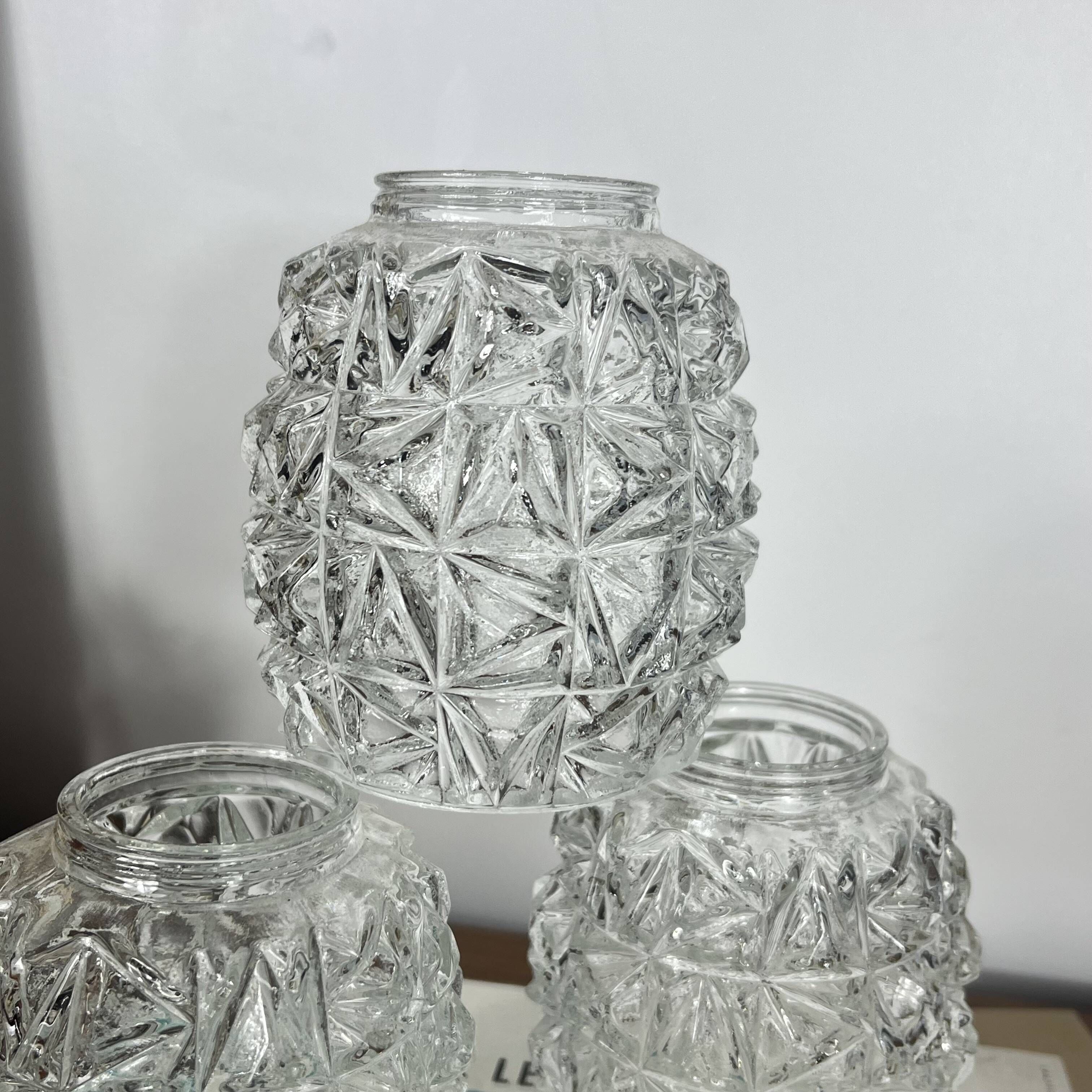 Set of 4 small vintage tulips in clear moulded glass.