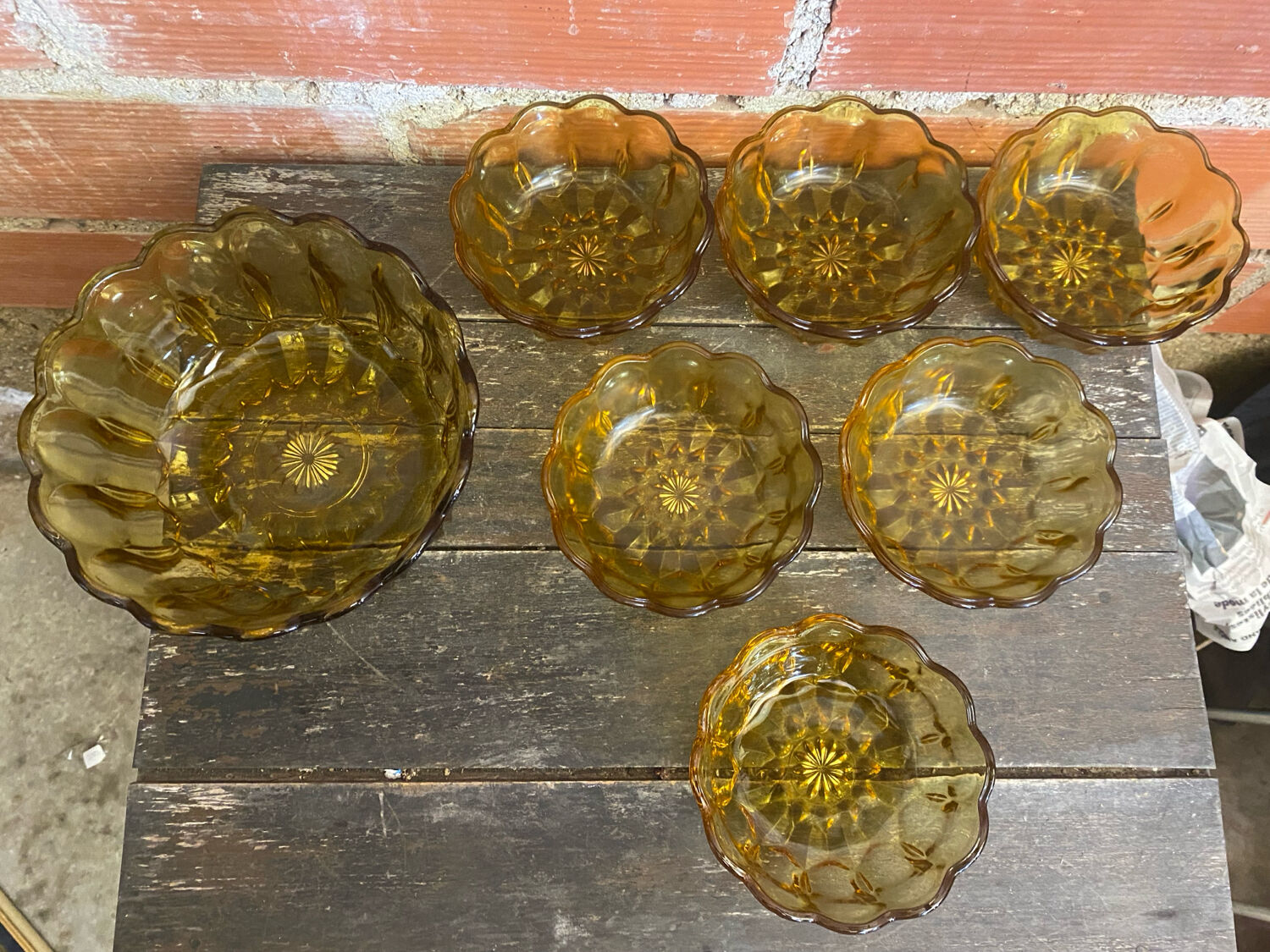 Salad bowl + 6 vintage amber orange moulded glass bowls from the 1970s.