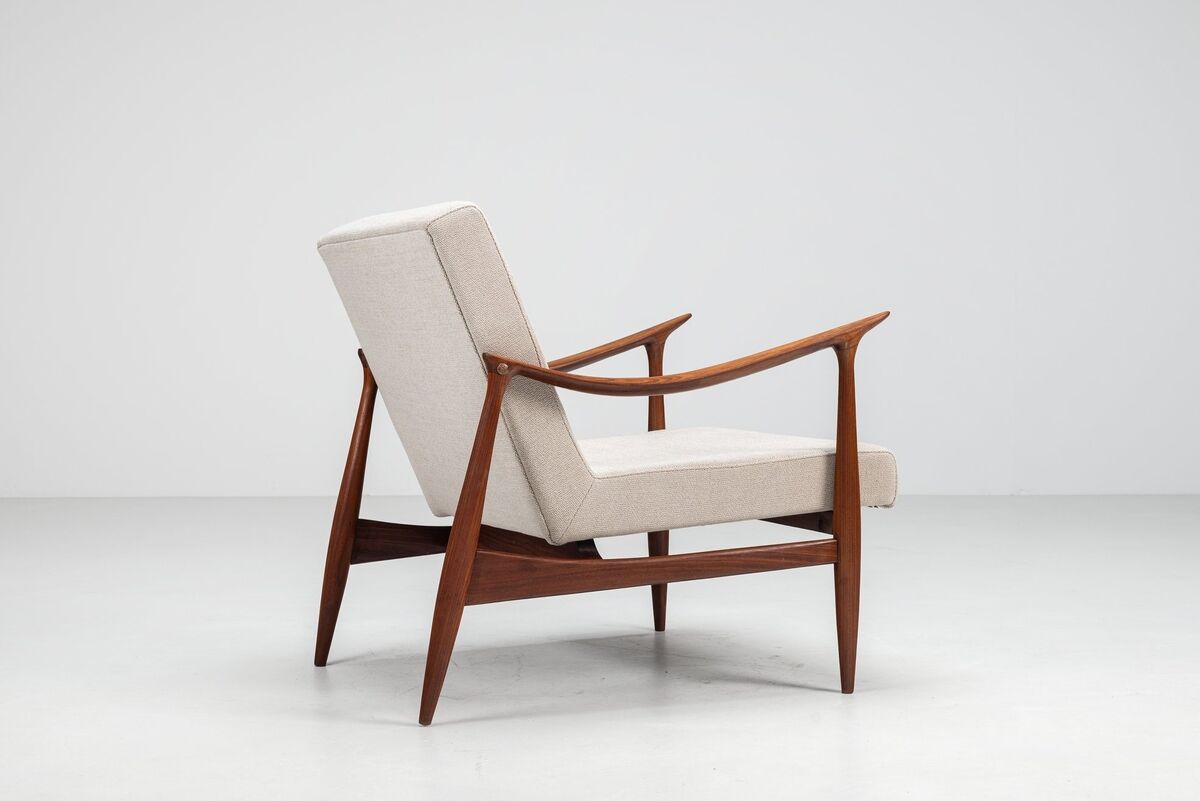 Sculptural Danish lounge chair in teak and fabric Denmark 1960