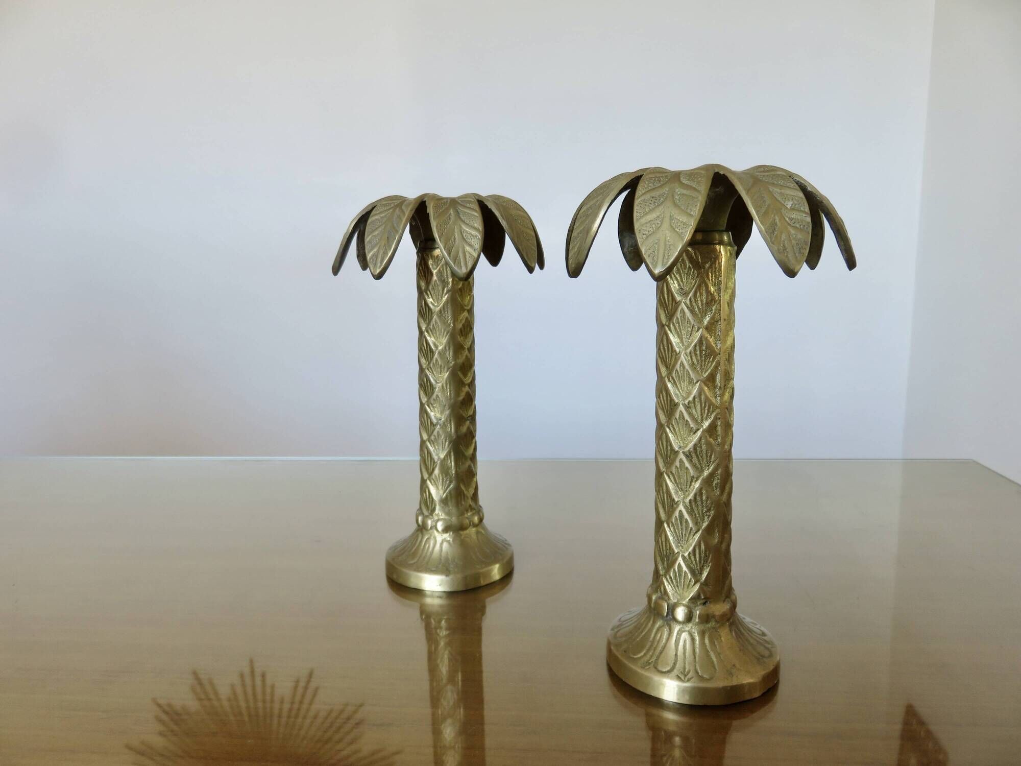 Pair of "palm tree" candlesticks in solid gilded brass, 1970