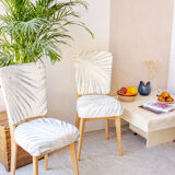 Pair of vintage chairs reupholstered with palm pattern fabric