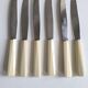 Set de 6 couteaux en inox et bakélite