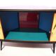 Corner chest of drawers with sliding doors