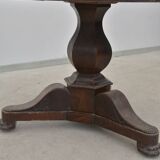 Round table in wood and marble