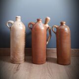 Trio of sandstone carafes with cove