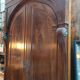 A walnut wardrobe with marquetry and boxwood stringing, dating from the Consulate period, circa 1810.
