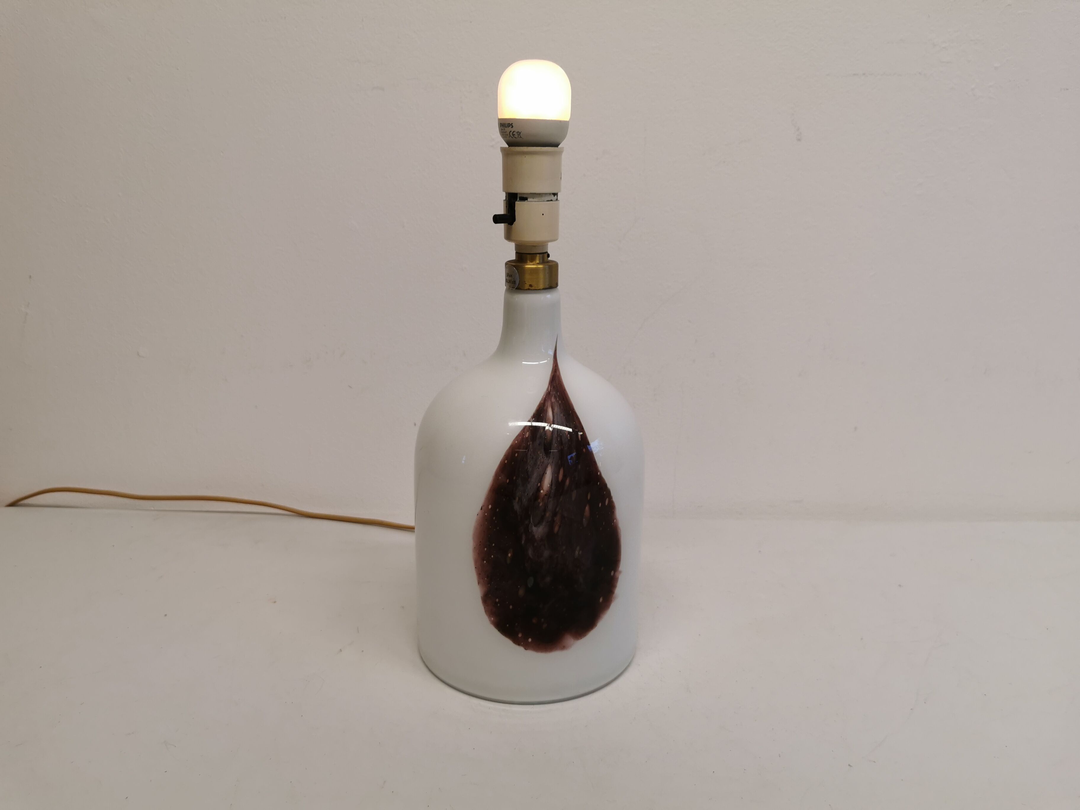 Older table lamp in milky white opaline glass with purple pattern / details from danish holmegaard.