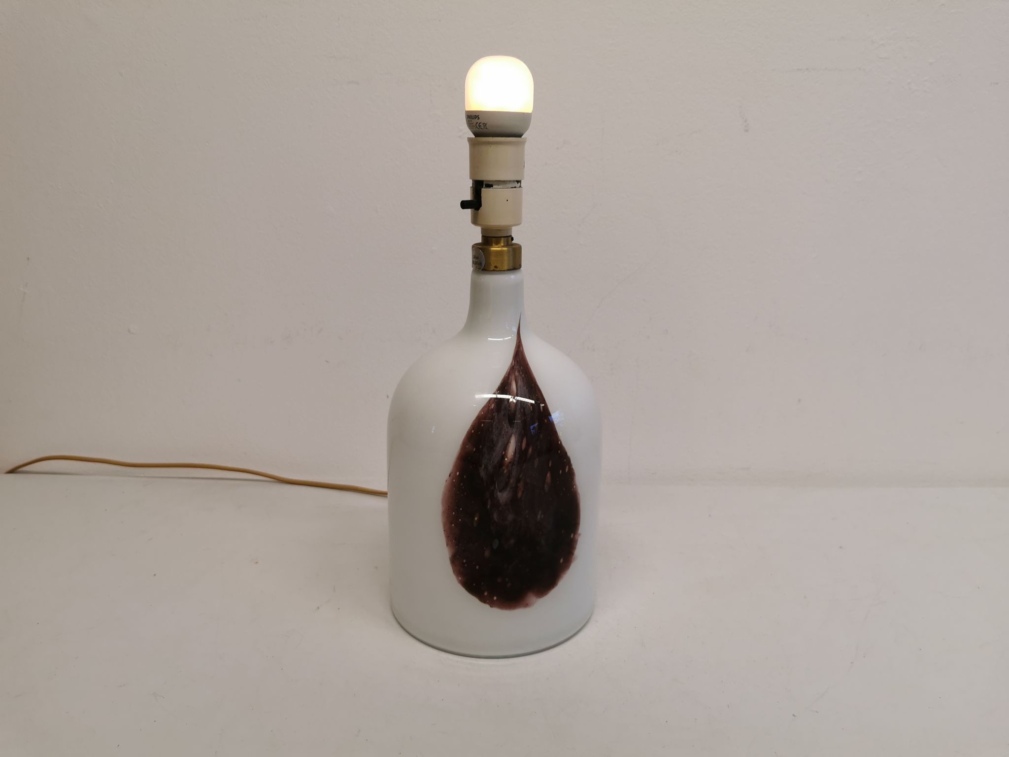 Older table lamp in milky white opaline glass with purple pattern / details from danish holmegaard.