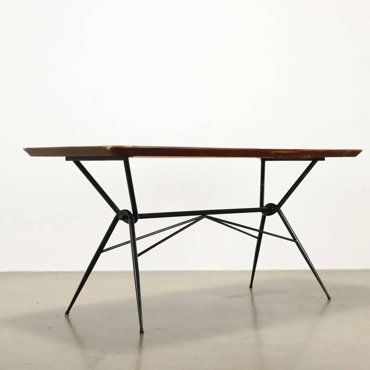 1960s vintage table made of wood and metal with a glass top, Italy.