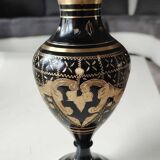 Vintage brass vase with black and gold patina, corolla neck. From India. Mid-20th century. Engraved heart/floral/leafy patterns. High 20 cm