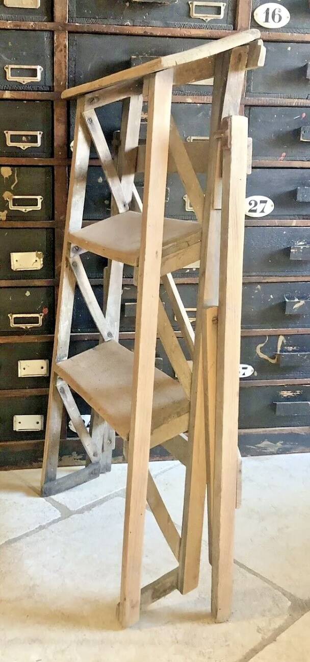 Old small painter's stepladder, wooden trade furniture, step stool