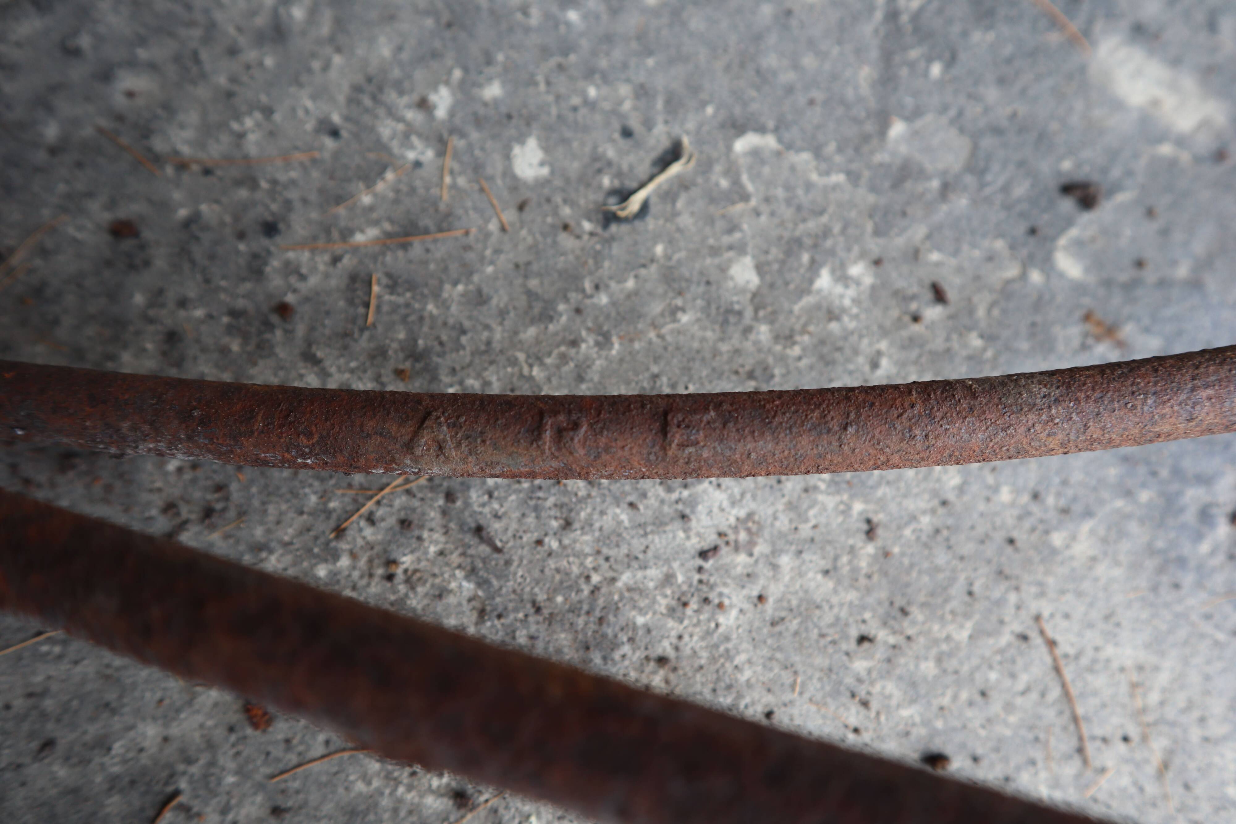 Set of three sculptural iron chairs