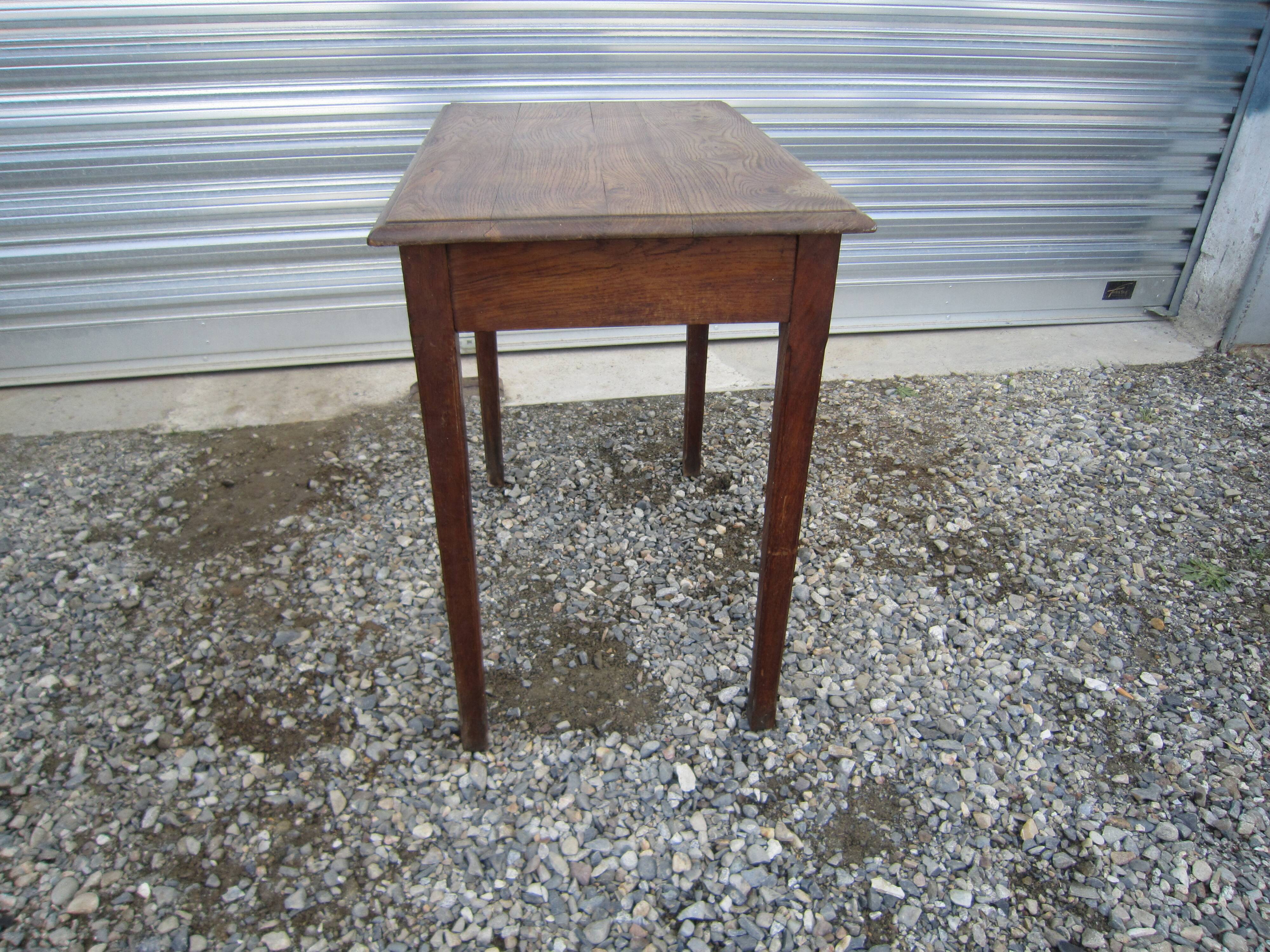 Wooden side table with drawer
