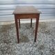 Wooden side table with drawer