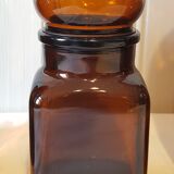 Series of 4  amber glass jars 70