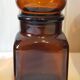 Série de 4 bocaux en verre ambré 70