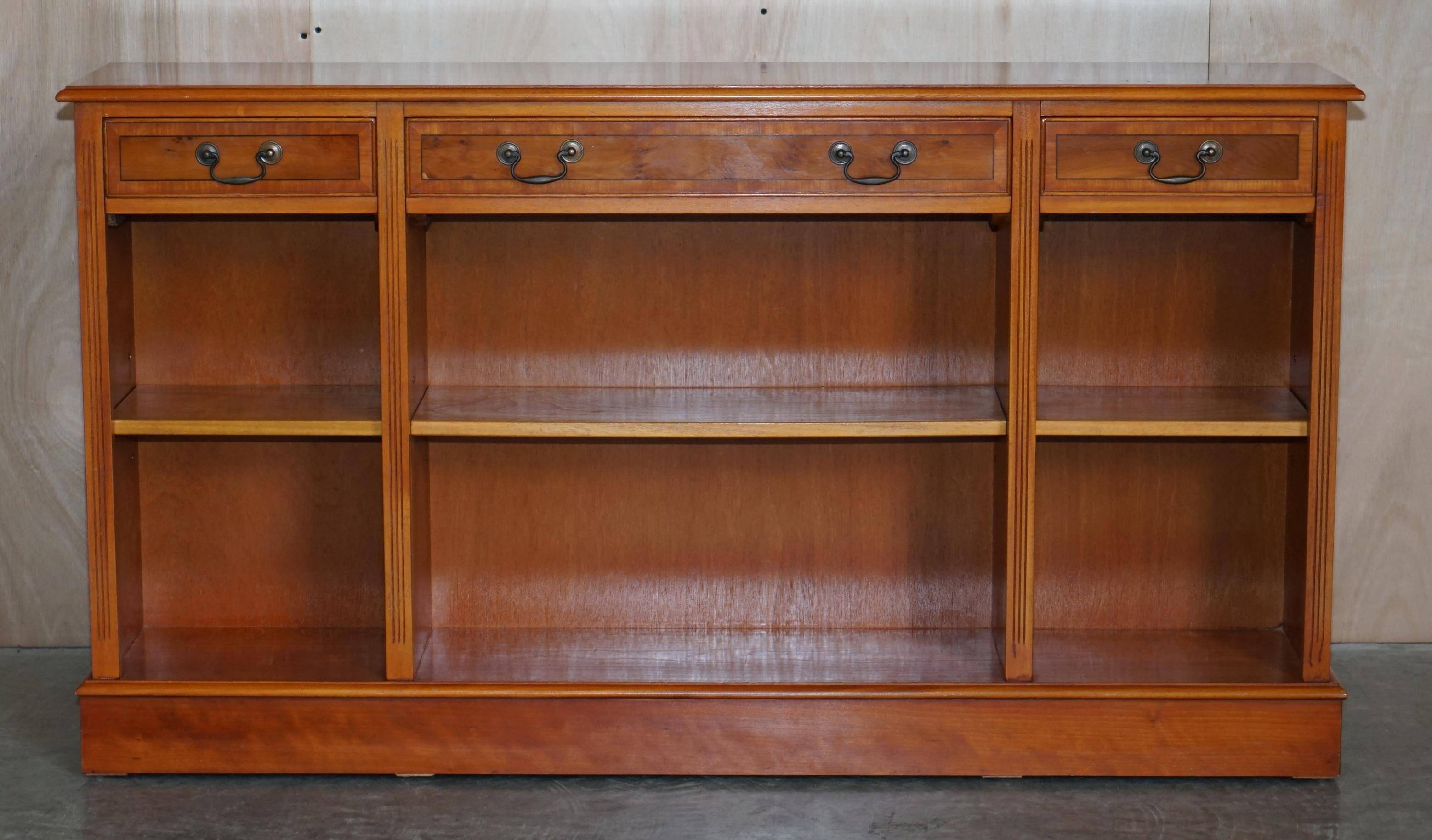 Vintage yew wood library/buffet with three drawers.