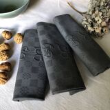 Suite of four napkins tinted in smoke grey