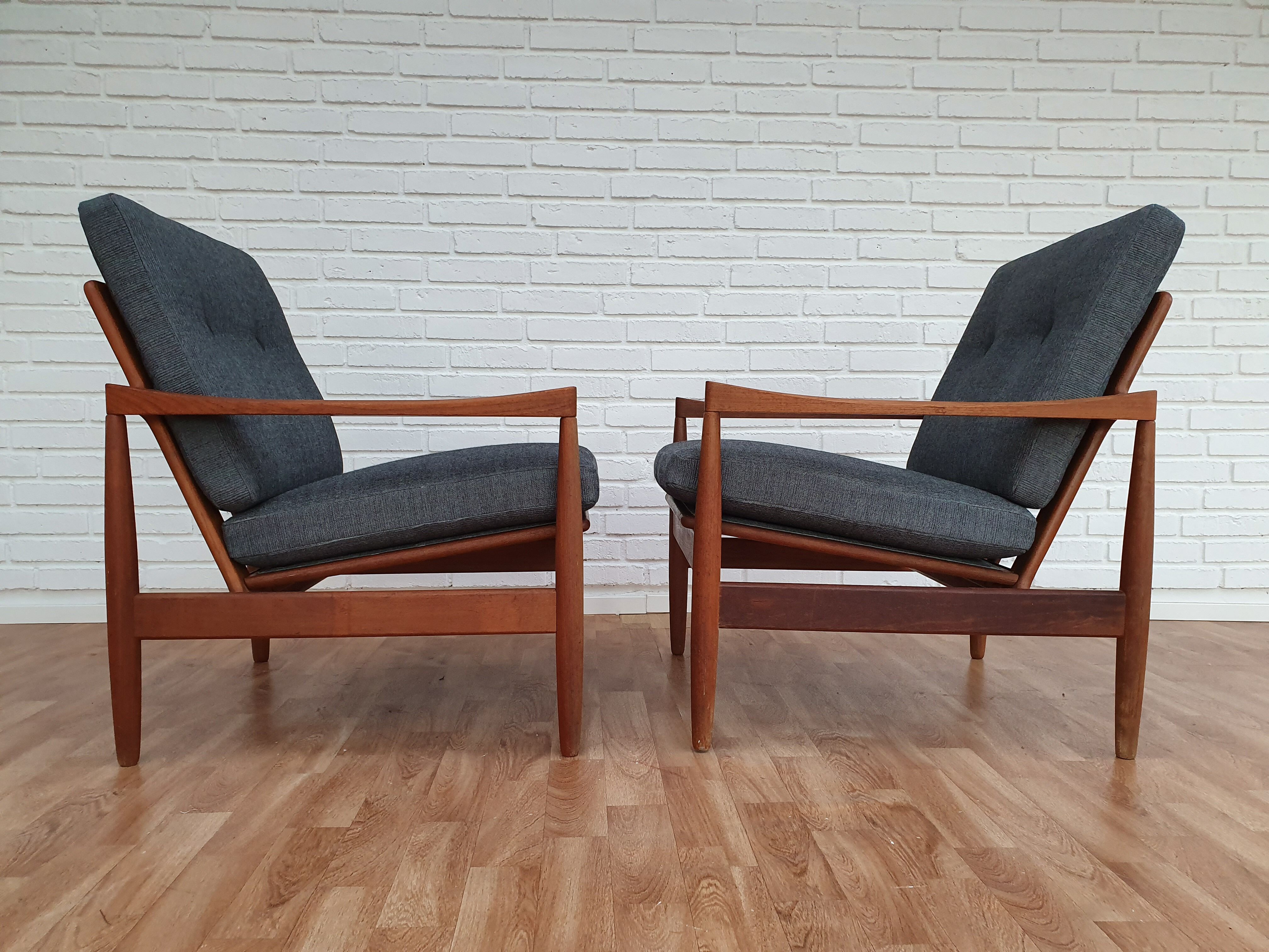 A pair of Danish armchairs, teak, wool, leather