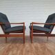 A pair of Danish armchairs, teak, wool, leather