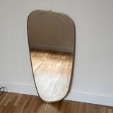 Asymmetrical brass mirror