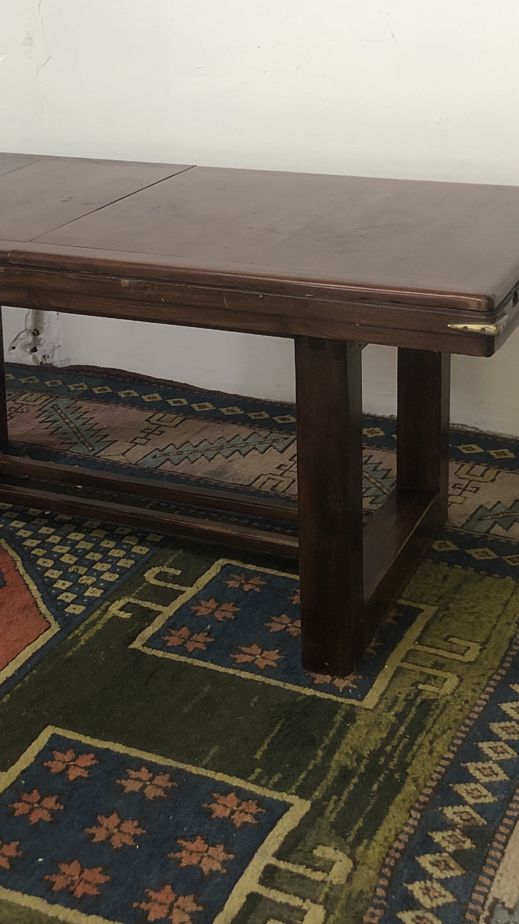 Mahogany table with brass angles