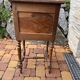Wooden bedside table with marble top