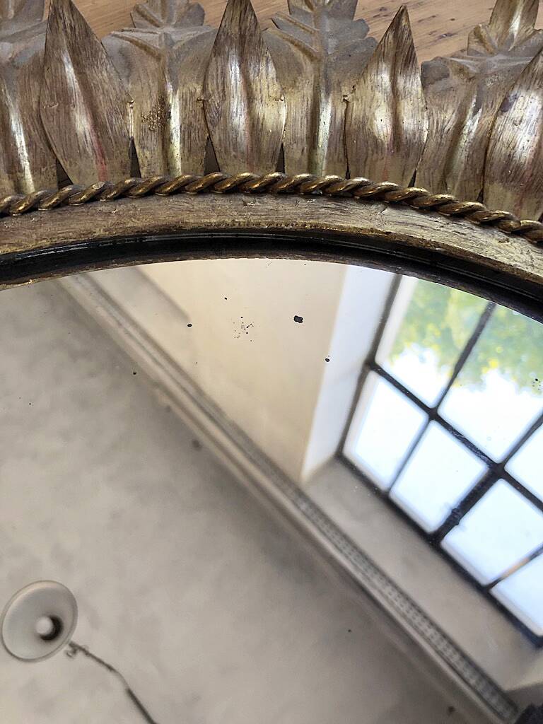 Old flowered sun golden mirror