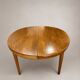 Vintage extendable round table, French made from the 1960s/70s.