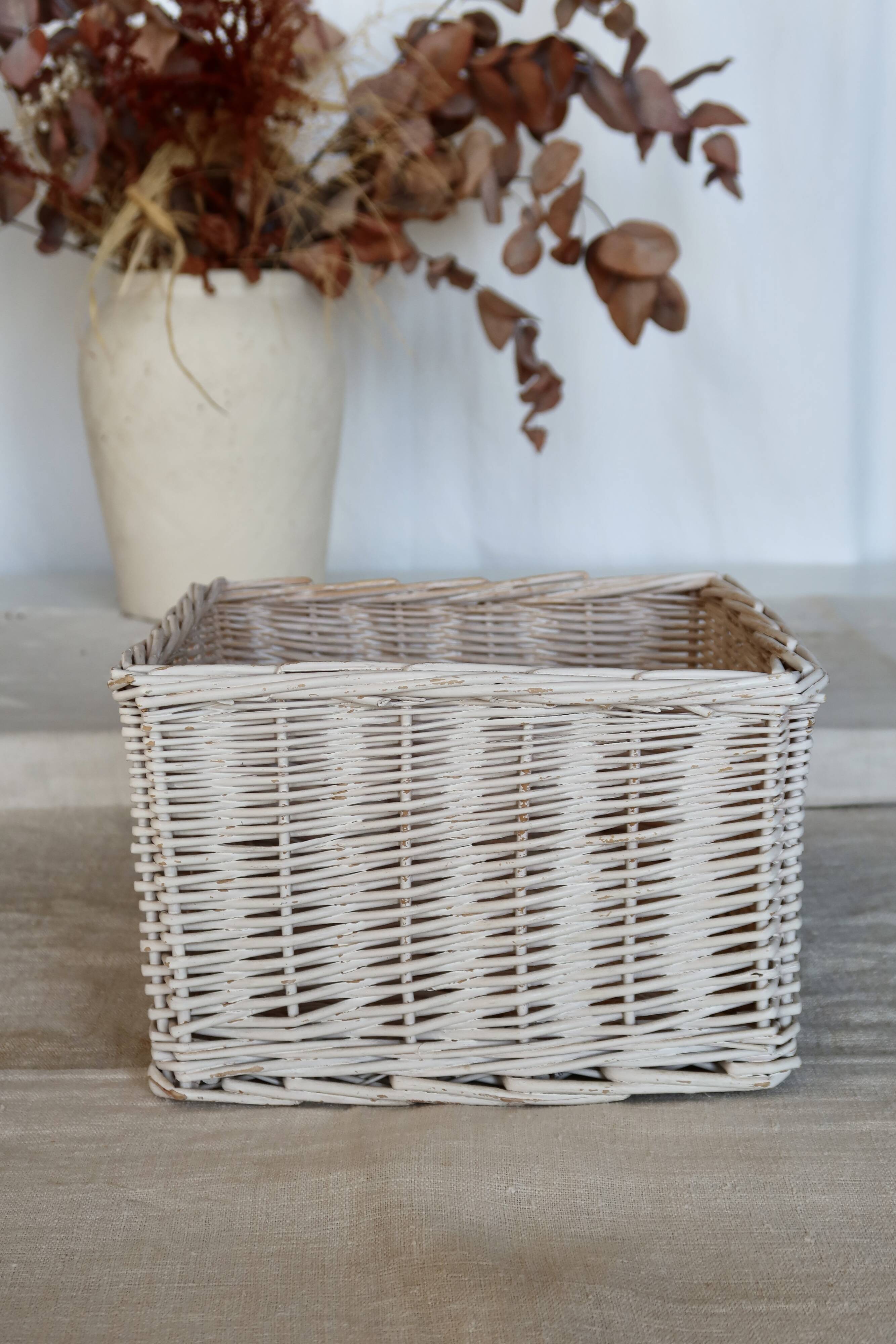 Vintage white wicker storage baskets