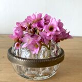 Pique flowers in metal circled glass