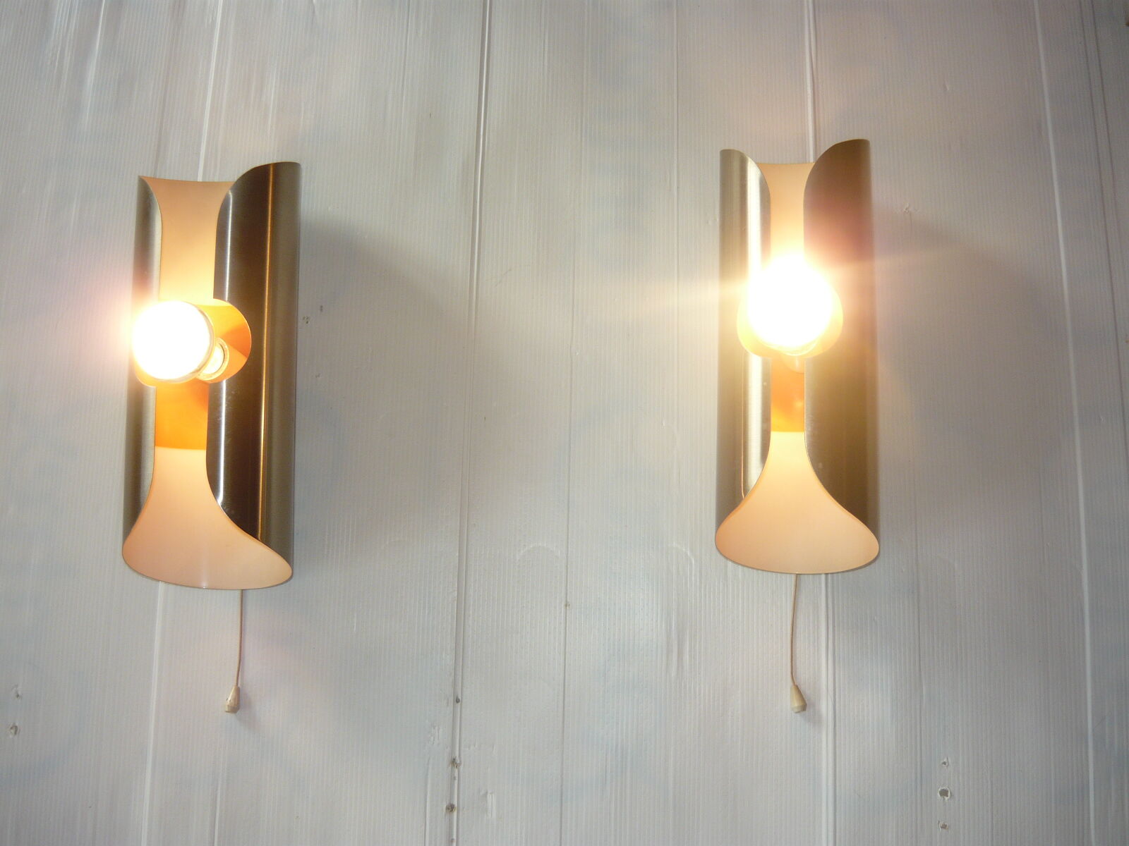 Pair of cylindrical stainless steel wall lamps space age years 70