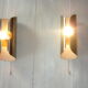 Pair of cylindrical stainless steel wall lamps space age years 70