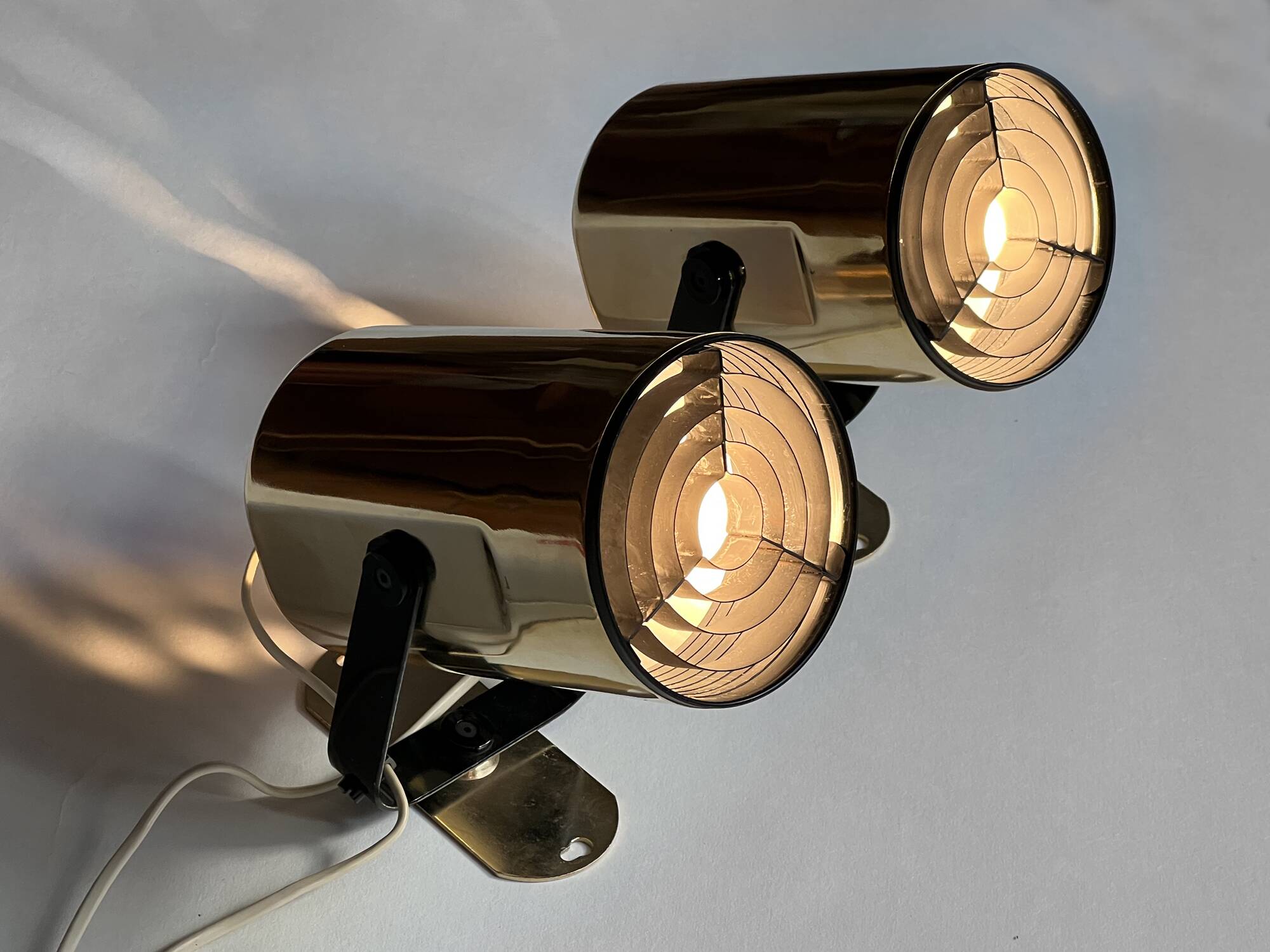 Pair of golden wall lights "Orion" by Per Sundstedt for Kosta Lampan. Sweden 1970s