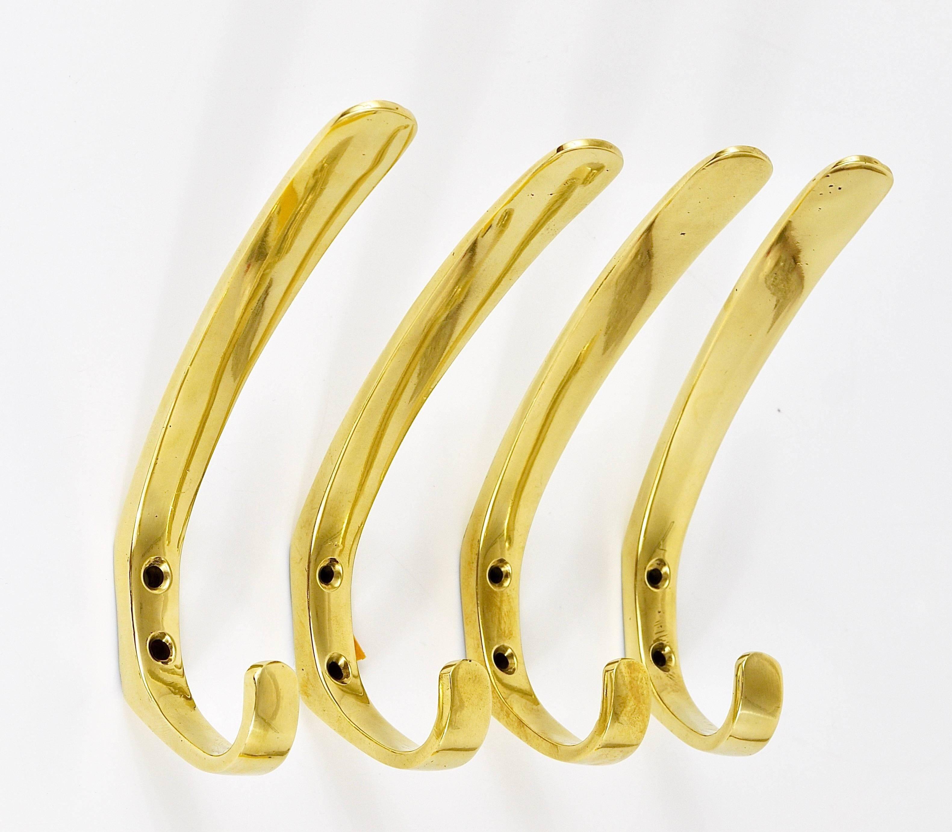 Up to four mid-century brass wall hooks by Herta Baller, Austria, 1950s.