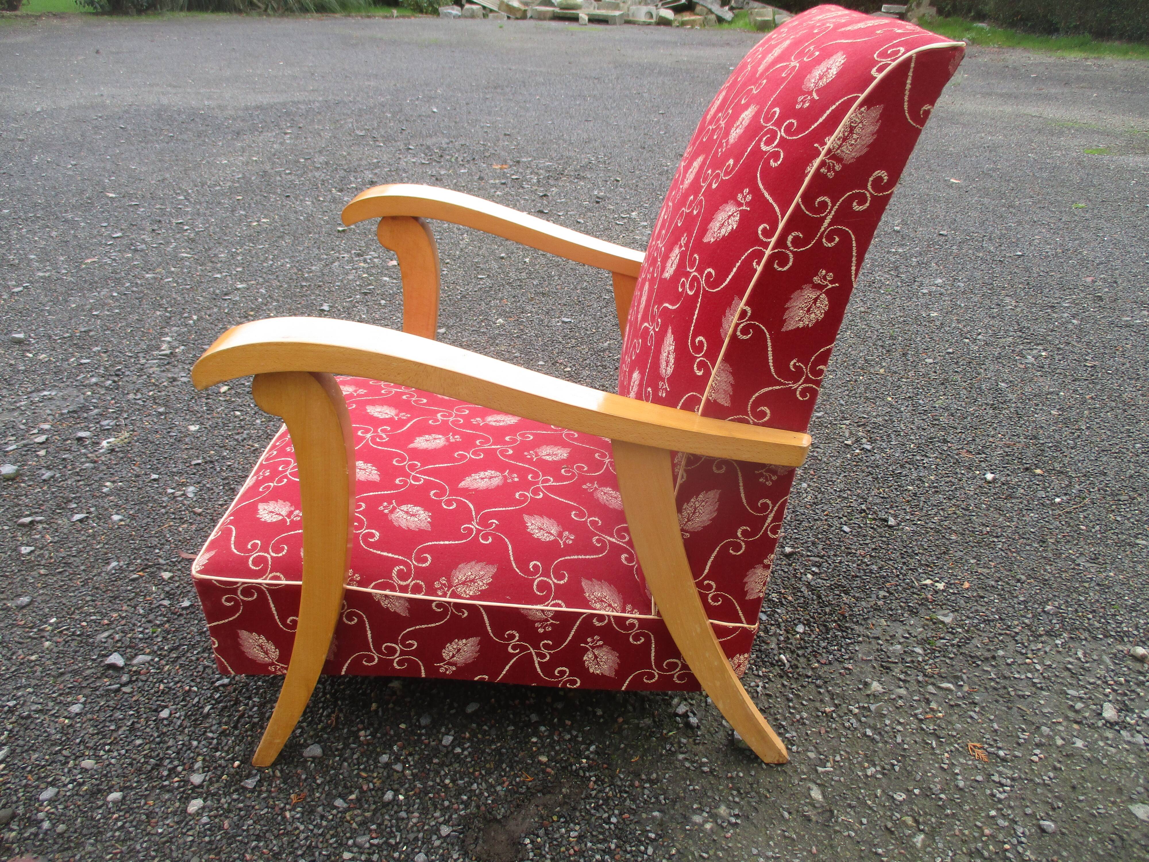Scandinavian armchair in wood and red fabric