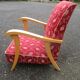 Fauteuil scandinave en bois et tissu rouge