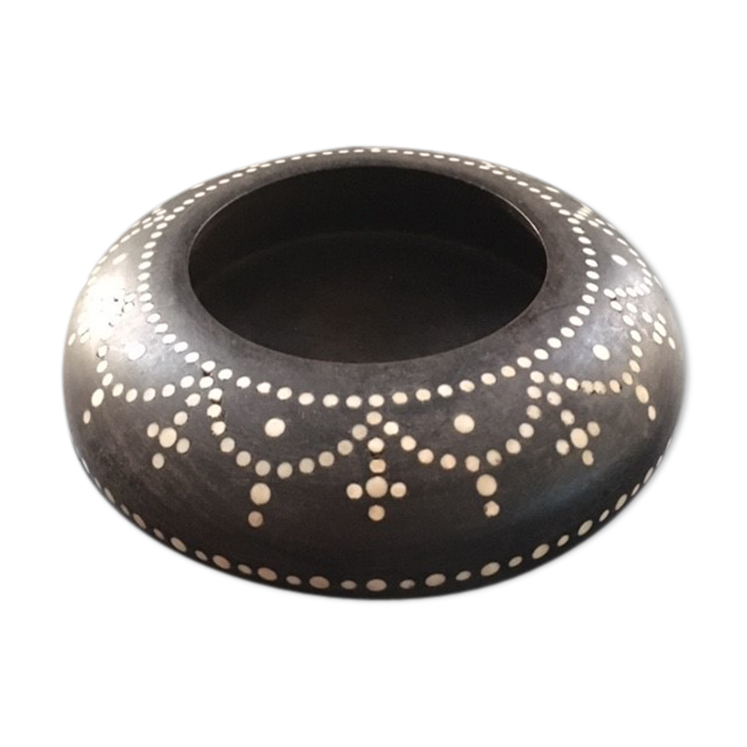 Black wood and mother-of-pearl pocket emptier