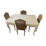 One table table and 8 oak chairs