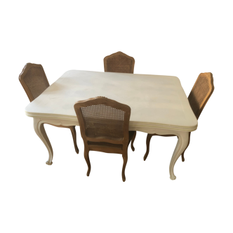 One table table and 8 oak chairs