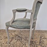 Louis XV style cabriolet armchair in patinated wood and velvet