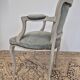 Louis XV style cabriolet armchair in patinated wood and velvet