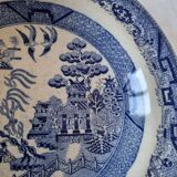 Exquisite Japanese antique deep plate with classic willow pattern from the 19th century