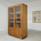 Oak glass-fronted school cabinet 1960