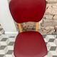 Chaise skaï rouge années 60