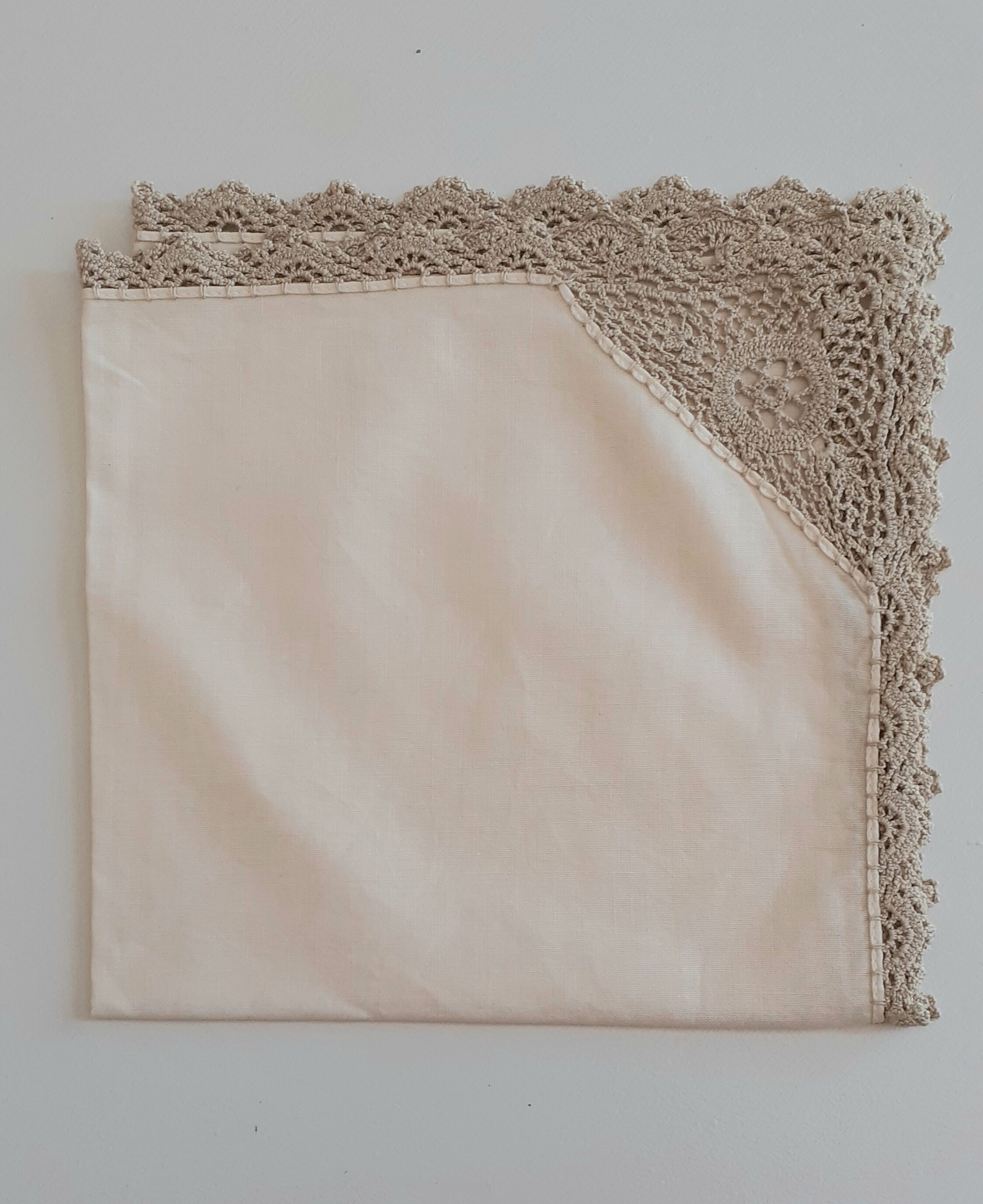 Old crochet round tablecloth with matching napkins