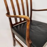 Mid-century armchair by Ole Wanscher for Fritz Hansen, stained beech and leather.