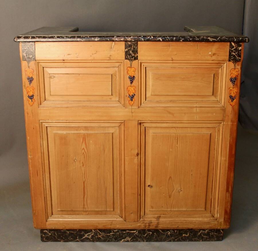 Counter bank with grape decoration