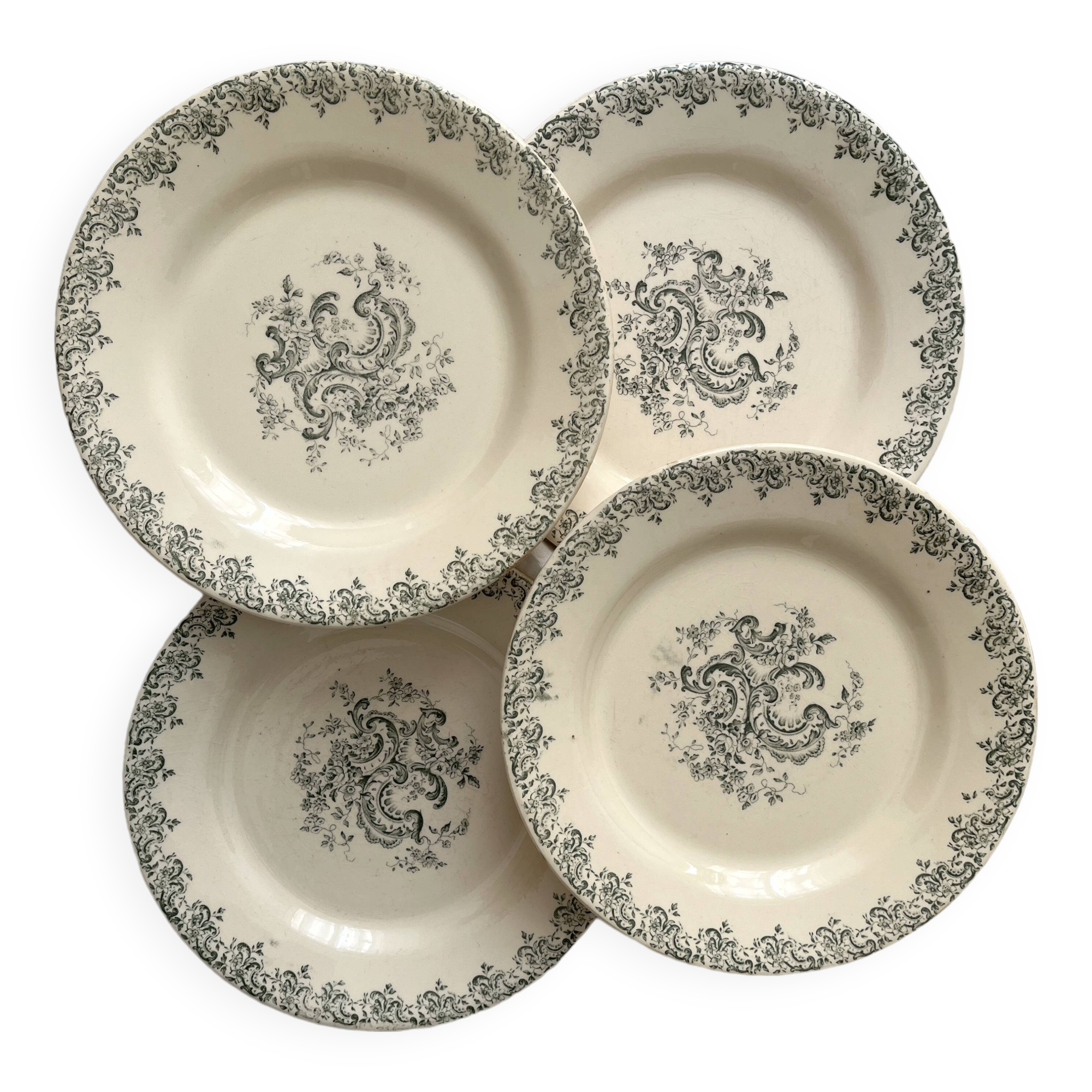 4 flat ironware plates "Louis XV" Gien 19th century
